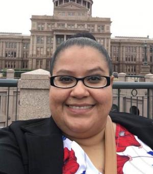 Maggie Luna in front of the Texas Capitol